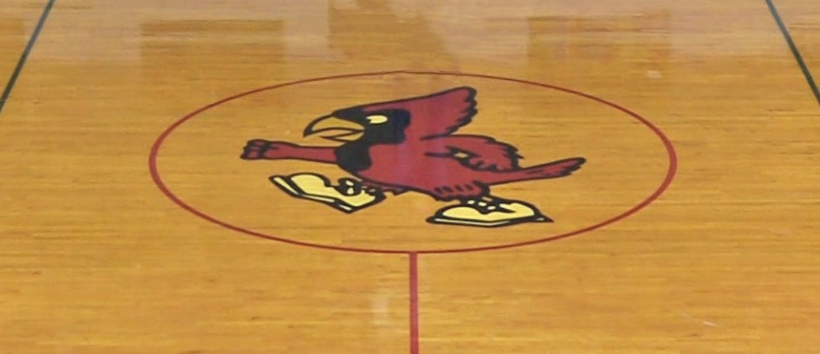 Cuba Cardinal logo in center of the gym floor